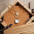 Zendala Layering-Halskette Perlmutt/Gold - Holzkern Modell: Jewelry