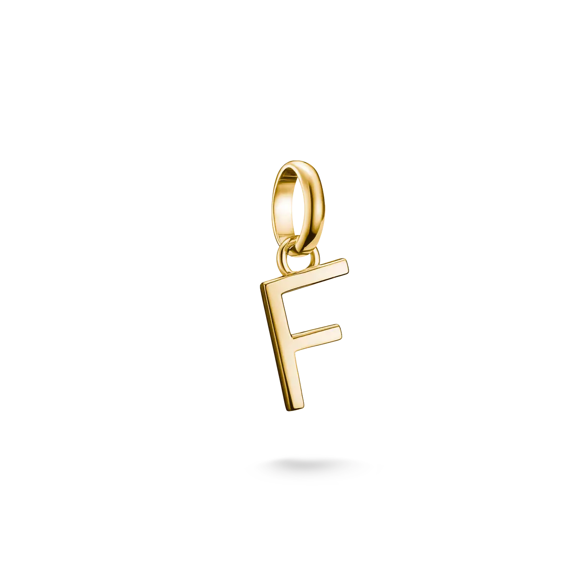 Pozłacany charms w kształcie litery F z metalowym oczkiem