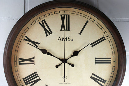 AMS Horloge murale 42x42x8 cm Métal • Mouvement radio-piloté silencieux • Chiffres romains