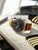 Zegarek męski Zeppelin Chronograph, widok z boku, brązowy skórzany pasek, ciemna tarcza
